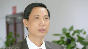 Le Van Thuy, vice-président de l’Association générale des Vietnamiens au Laos, répond à une interview de la VNA. Photo : VNA.