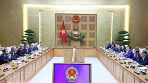 Lors de la séance de travail. Photo : VNA.