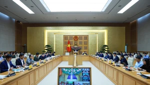 Le Premier ministre Pham Minh Chinh préside la visioconférence pour évaluer l'avancement de la « Campagne Quang Trung ». Photo : VNA.