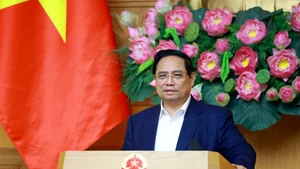 Le Premier ministre Pham Minh Chinh s'exprime lors de la réunion. Photo : VNA.