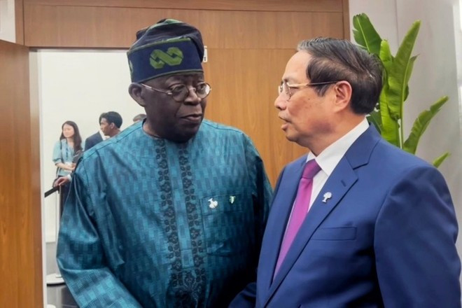 Le Premier ministre Pham Minh Chinh (droite) et le président nigérian Bola Ahmed Tinubu. Photo : VGP. Le Premier ministre Pham Minh Chinh (droite) et le président nigérian Bola Ahmed Tinubu. Photo : VGP.