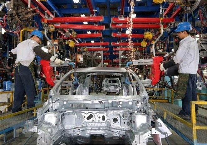 Chaîne de production et d'assemblage de voitures dans une usine Ford. Photo : VNA Chaîne de production et d'assemblage de voitures dans une usine Ford. Photo : VNA