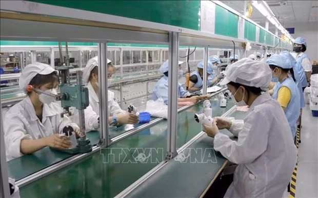 Environ 92% des travailleurs retournent au travail après le Têt. Photo : VNA.