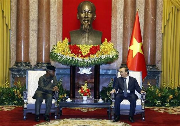 Le Président Nguyên Xuân Phuc (à droite) et le Vice-Président nigérian Y. Osinbajo. Photo : VNA.