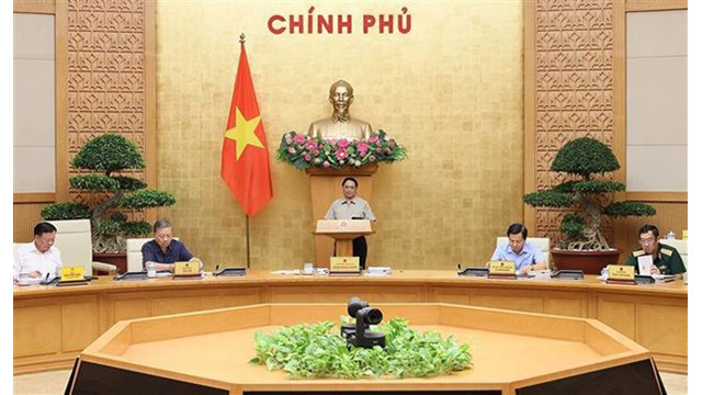 Le Premier ministre Pham Minh Chinh préside la réunion. Photo : VNA.
