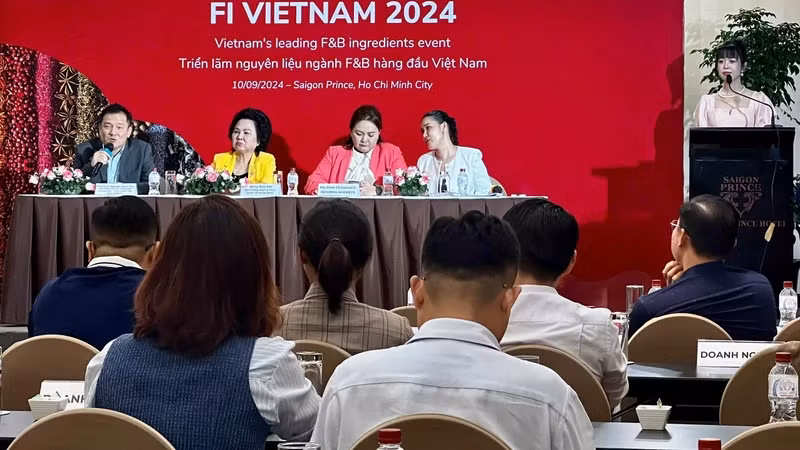 Lors du programme d'échange d'informations tenu le 10 septembre à Hô Chi Minh-Ville sur les potentiels, les opportunités et les défis dans le secteur des aliments et des boissons. Photo : Le comité d'organisation.