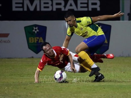 Le match amical au stade Hoa Xuan. Photo: VNA