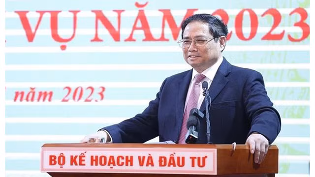 Le Premier ministre Pham Minh Chinh s’adressant à la conférence hybride au siège du MPI à Hanoi avec 63 provinces et villes. Photo : VNA