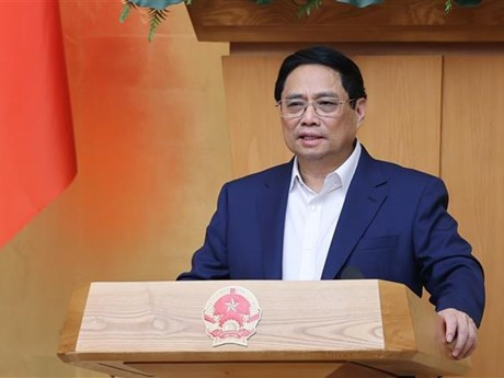 Le Premier ministre Pham Minh Chinh prend la parole lors de la réunion. Photo : VNA.