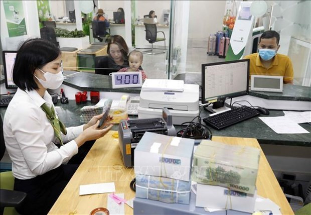 Transactions à Vietcombank. Photo : VNA