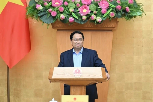 Le Premier ministre Pham Minh Chinh prend la parole lors de la réunion. Photo : NDEL.
