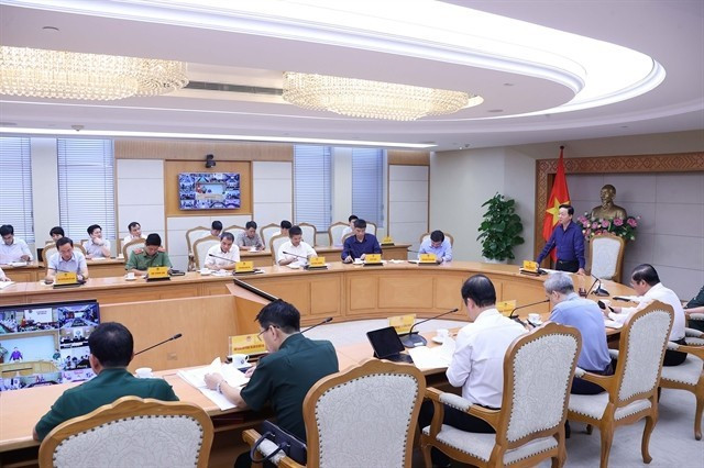 Le vice-Premier ministre Tran Hong Ha préside une réunion avec les ministères et les localités sur la réponse au typhon Matmo. Photo : VNA. Le vice-Premier ministre Tran Hong Ha préside une réunion avec les ministères et les localités sur la réponse au typhon Matmo. Photo : VNA.
