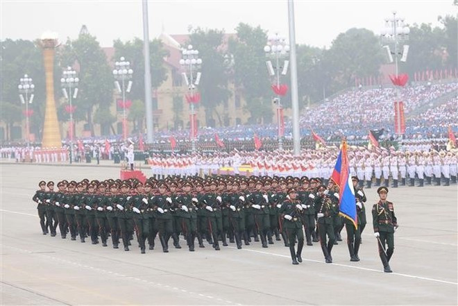 Le contingent militaire lao lors de l'événement. Photo : VNA. Le contingent militaire lao lors de l'événement. Photo : VNA.