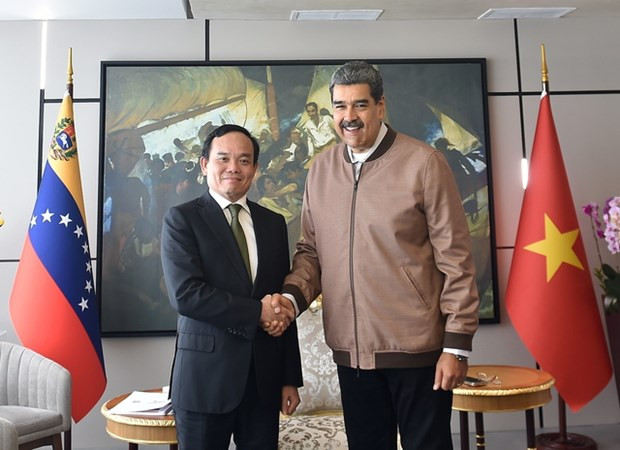 Le président vénézuélien Nicolás Maduro Moros et le vice-Premier ministre Tran Luu Quang (à gauche). Photo : VGP