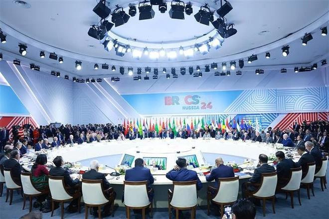 Le Premier ministre Pham Minh Chinh à la séance plénière du sommet des BRICS+ 2024. Photo : VNA.. Le Premier ministre Pham Minh Chinh à la séance plénière du sommet des BRICS+ 2024. Photo : VNA..