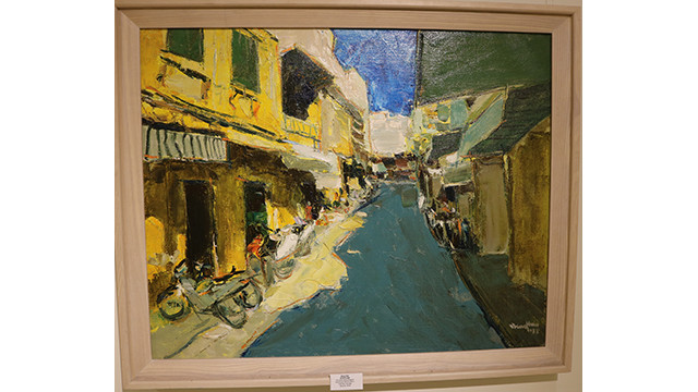 Exposition de peintures sur la capitale Hanoi ảnh 4