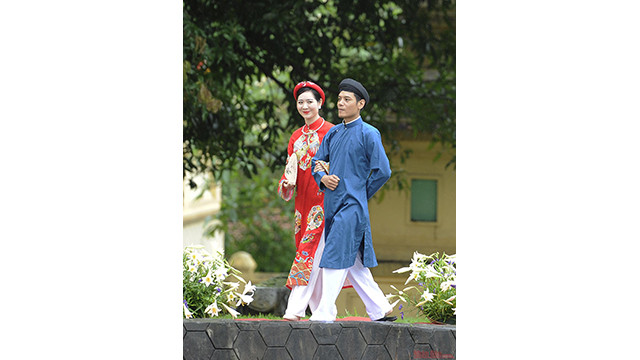 La beauté traditionnelle du "áo dài" ảnh 6 La beauté traditionnelle du "áo dài" ảnh 6