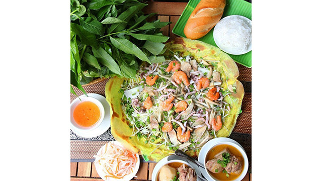 Venir à l'île de Binh Ba pour admirer la belle nature et déguster des fruits de mer frais ảnh 4