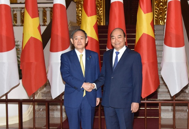 Le PM Nguyên Xuân Phuc accueille son homologue japonais ảnh 2 Le PM Nguyên Xuân Phuc accueille son homologue japonais ảnh 2