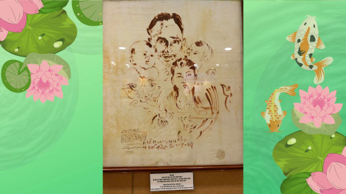Le tableau intitulé « L’Oncle Hô avec les enfants du Centre, du Sud et du Nord », dessiné par l’artiste Diep Minh Chau avec son propre sang. Photo : My Hanh/NDEL.
