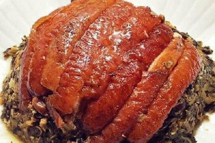 Khau nhuc a la particularité de donner une viande tendre qui fond dans la bouche. Photo : Vietnamnet. Khau nhuc a la particularité de donner une viande tendre qui fond dans la bouche. Photo : Vietnamnet.