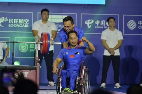 Le Van Cong remporte une médaille de bronze lors des 4es Jeux paralympiques asiatiques. Photo: VNA