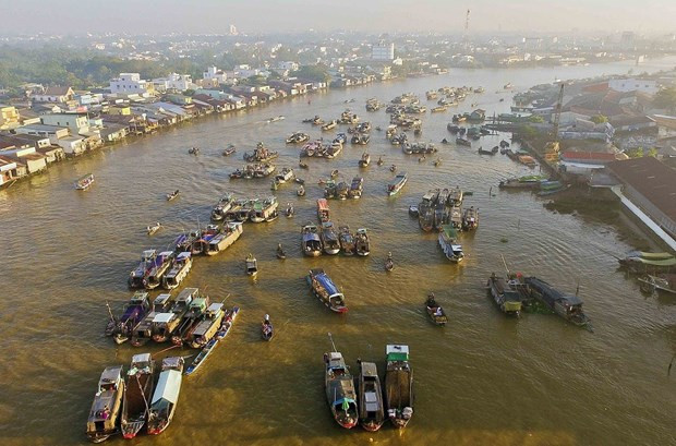 Le marché flottant de Cai Rang dans la ville de Cân Tho. Photo: VNA Le marché flottant de Cai Rang dans la ville de Cân Tho. Photo: VNA