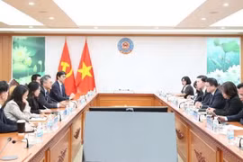 La réunion entre le vice-ministre vietnamien des Finances, Tran Quoc Phuong, et Bing Li, président de Bloomberg pour la région Asie-Pacifique. Photo : tapchikinhtetaichinh.