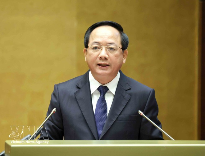 Trinh Van Quyet, membre du Bureau politique, secrétaire du Comité central et chef de la Commission centrale de la sensibilisation, de l’éducation et de la mobilisation des masses, présente les points essentiels de la Résolution n° 80-NQ/TW. Photo : VNA