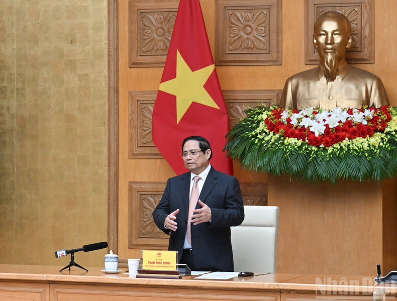 Le Premier ministre Pham Minh Chinh prend la parole lors de la rencontre.