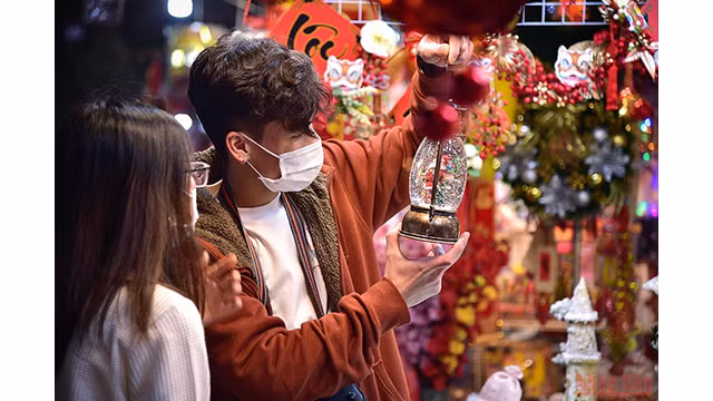Hanoï et Hô Chi Minh-Ville célèbrent une saison de Noël spéciale ảnh 23 Hanoï et Hô Chi Minh-Ville célèbrent une saison de Noël spéciale ảnh 23