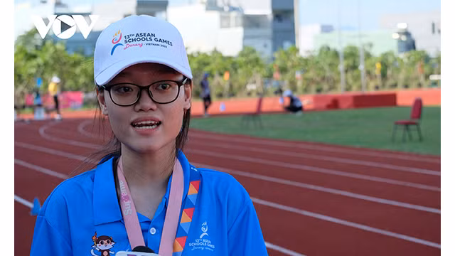Nguyên Pham Tra My, bénévole de la délégation sportive malaisienne. Photo : VOV.