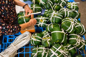 En 2011, le village de Tranh Khuc, spécialisé dans la fabrication du banh chung, a été reconnu comme village de métier traditionnel par le Comité populaire municipal de Hanoi. Photo : langngheviet.