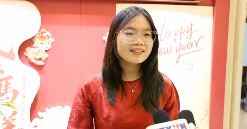 De nombreux étudiants vietnamiens en Chine expriment leur intérêt pour cet événement politique majeur. Photo: VNA