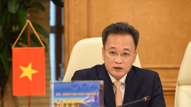L’auditeur général de l’État du Vietnam, Nguyen Huu Nghia, s'exprime lors du colloque. Photo : congthuong.vn.