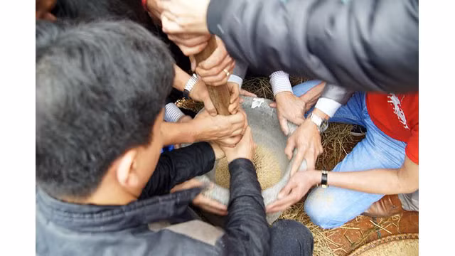 La fête de la cuisson du riz au village Thi Câm ảnh 6