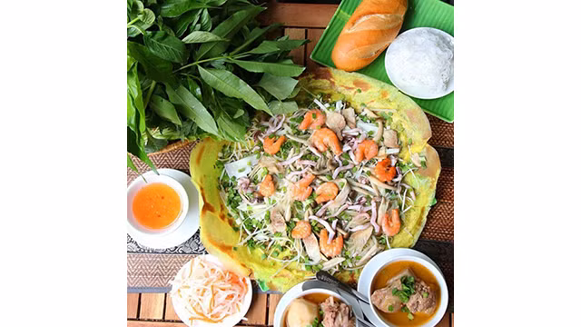 Venir à l'île de Binh Ba pour admirer la belle nature et déguster des fruits de mer frais ảnh 4