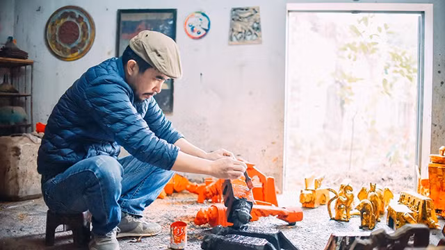 Un artisan vietnamien crée des sculptures de tigre pour l’accueil du Nouvel An 2022 ảnh 5