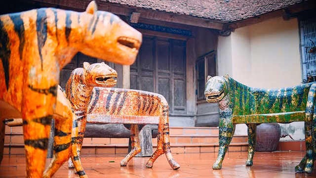 Un artisan vietnamien crée des sculptures de tigre pour l’accueil du Nouvel An 2022 ảnh 8
