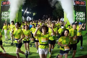 Les coureurs participent avec enthousiasme à la course. Photo : VNA.