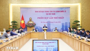 Le Premier ministre Pham Minh Chinh préside la première réunion du Comité de pilotage du Centre financier international au Vietnam. Photo : VNA.