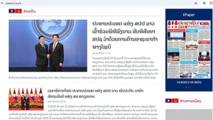 Le journal Pasaxon publie des articles saluant chaleureusement le succès de la cérémonie de signature de la Convention des Nations Unies contre la cybercriminalité, organisée par le Vietnam à Hanoï. Photo: NDEL