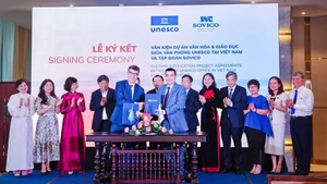 Lors de la cérémonie de signature entre l'UNESCO et la SOVICO. Photo: NDEL