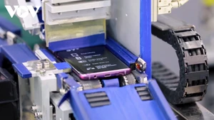 Le transfert de technologie via les projets d'IDE reste très limité. Photo: VOV