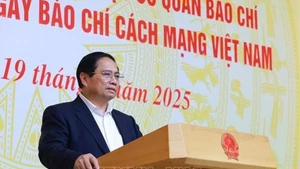 Le Premier ministre Pham Minh Chinh s’exprime lors de l’événement, à Hanoi, le 19 juin. Photo : VNA.
