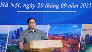 Le Premier ministre Pham Minh Chinh lors de la sixième réunion du Conseil de coordination de la région du delta du fleuve Rouge. Photo : VNA.