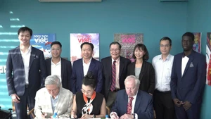 Lors de la cérémonie de la signature du projet. Photo: congthuong.vn