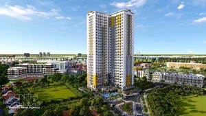 Immeuble d’appartements investi par le groupe BCONS dans le quartier de Bình Thắng, ville de Dĩ An, province de Bình Dương. Photo : VNA