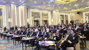 Lors de la conférence de promotion du commerce et de l'investissement entre le Vietnam et la Chine. Photo: NDEL