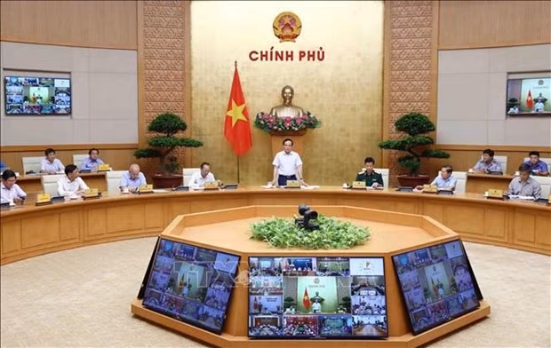  Le Vice-Premier ministre Trân Luu Quang préside la 7e réunion du Comité national de pilotage de la lutte contre la pêche INN. Photo : VNA.